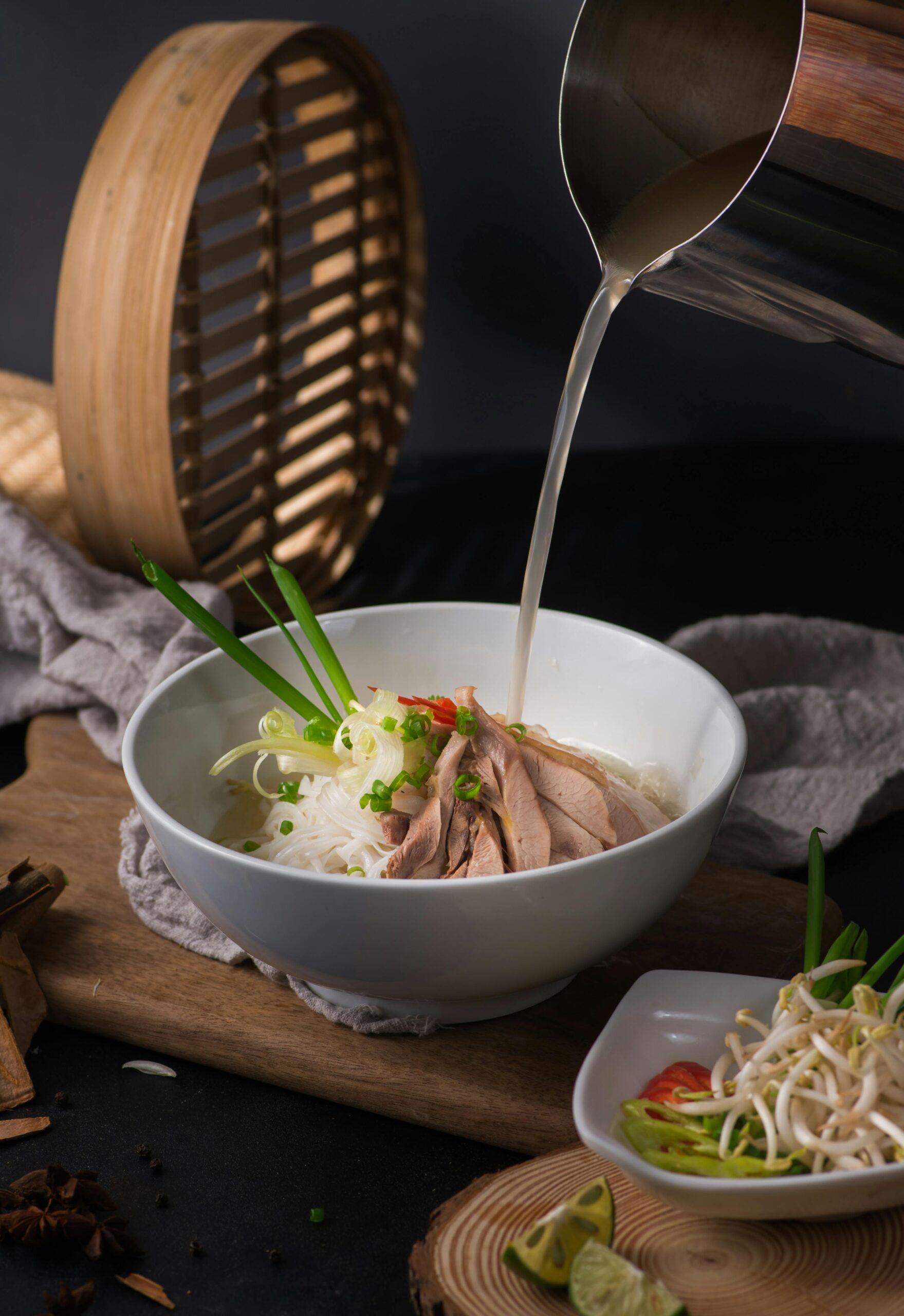 Authentic Phở Gà served with rice noodles and chicken in Hà Nội, Vietnam.